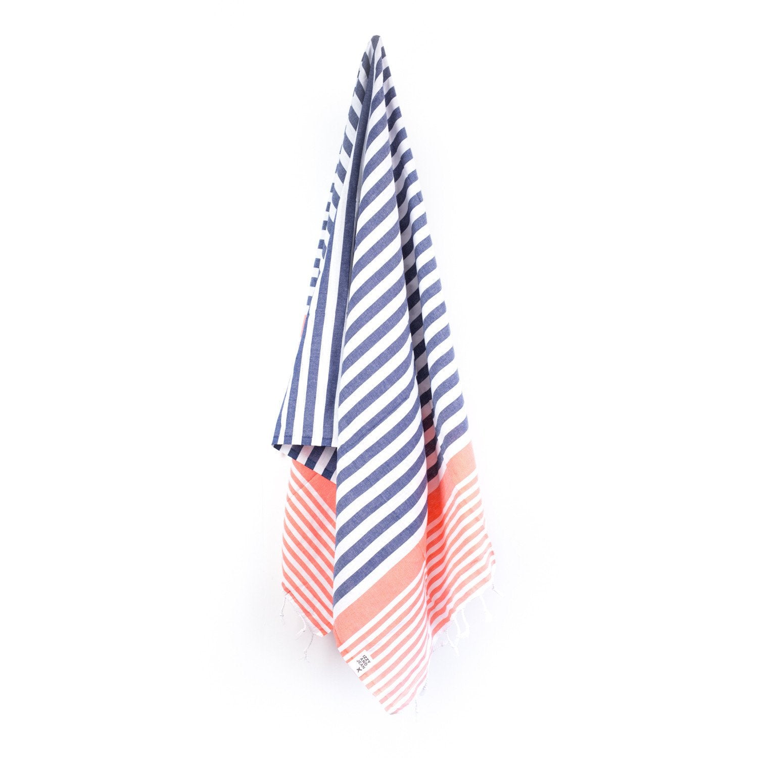 a blue and coral striped Turkish towel hanging on a peg
