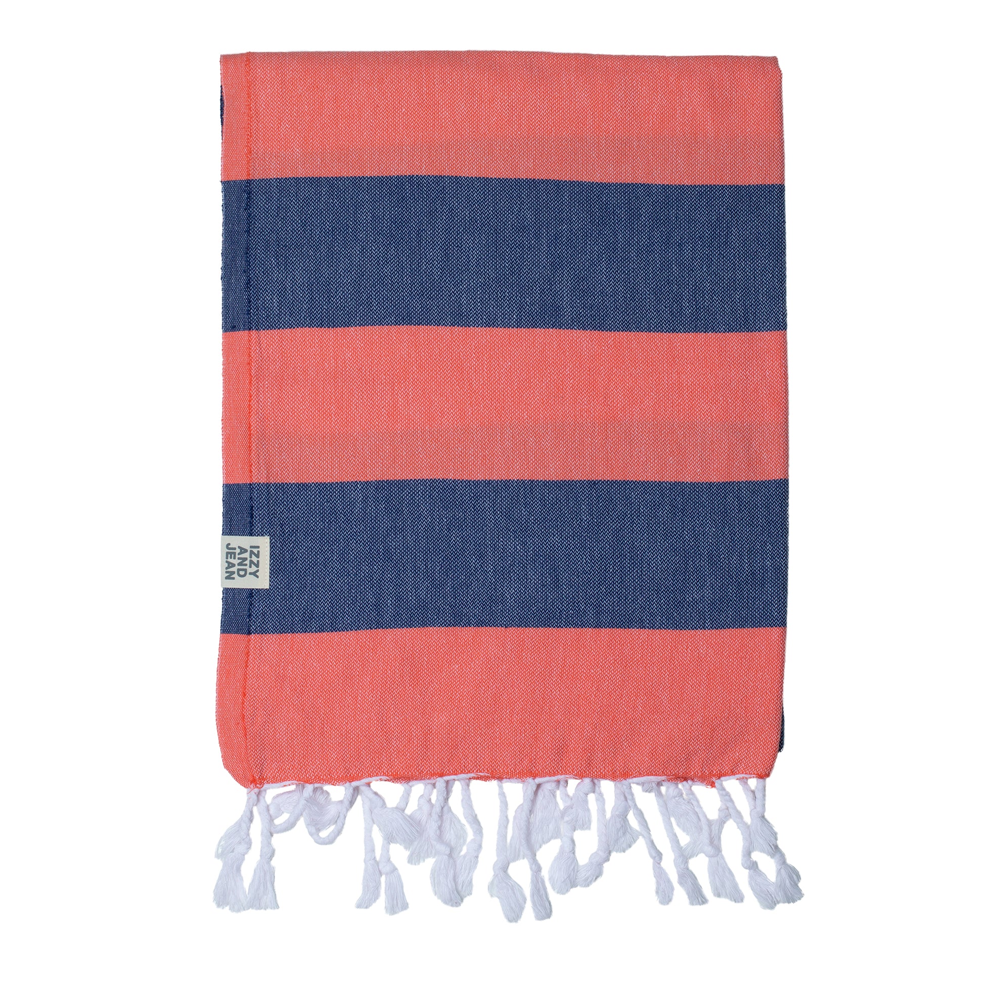 A folded santorini Turkish Towel in Navy and Coral large stripes, with white tassels at the end on a white background