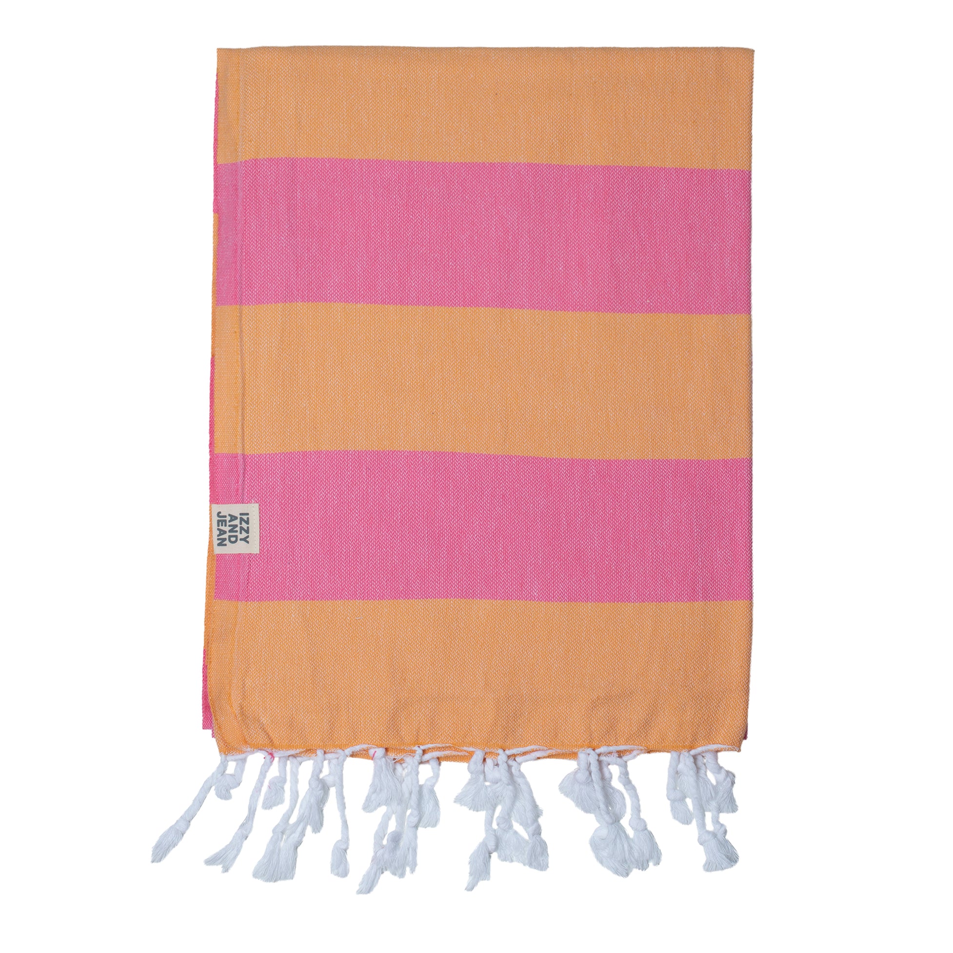 A striped Santorini Turkish towel beach towel with horizontal bands of melon and pink, with white fringes on the edges.