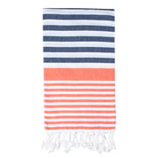 A striped Sofia Turkish towel in navy and coral with white stripes, displayed flat with fringes at the ends.