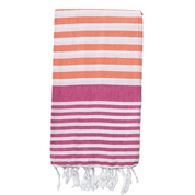 A coral and fuchsia Sofia Turkish Towel with white stripes and tassles.